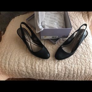 Black sling back pumps